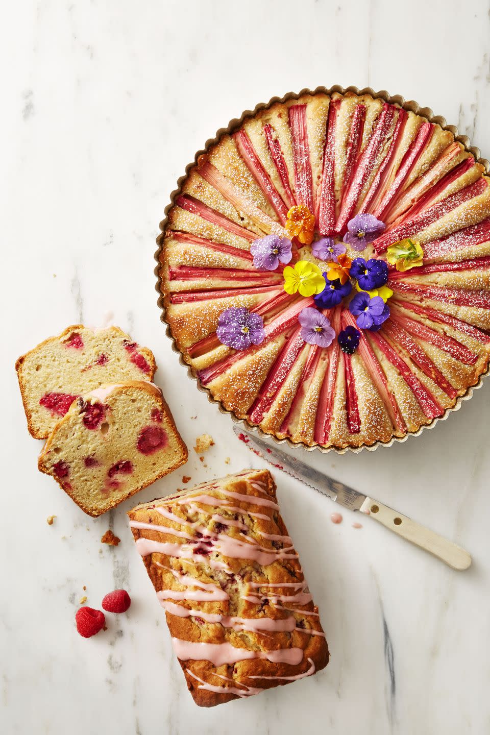 <p>Topped with a raspberry drizzle, this classic pound cake is totally photo-worthy.</p><p><a class="link " href="https://www.amazon.com/USA-Pan-1140LF-Bakeware-Aluminized/dp/B0029JQEIC/?tag=syn-yahoo-20&ascsubtag=%5Bartid%7C10055.g.19841885%5Bsrc%7Cyahoo-us" rel="nofollow noopener" target="_blank" data-ylk="slk:SHOP LOAF PANS;elm:context_link;itc:0;sec:content-canvas">SHOP LOAF PANS</a></p><p>Get the <strong><a href="https://www.goodhousekeeping.com/food-recipes/dessert/a38185/raspberry-lemon-pound-cake-recipe/" rel="nofollow noopener" target="_blank" data-ylk="slk:Raspberry Lemon Pound Cake recipe;elm:context_link;itc:0;sec:content-canvas" class="link ">Raspberry Lemon Pound Cake recipe</a></strong><em>.</em> <br></p>