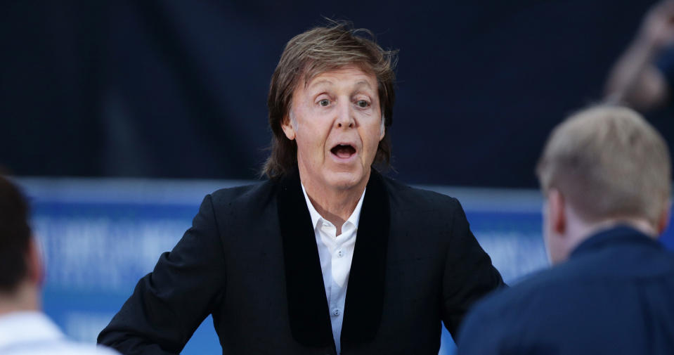 Paul McCartney in 2016 with obviously dyed brown hair. (PA Images).