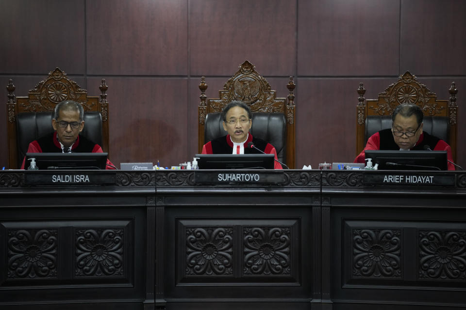 Chief Judge Suhartoyo, center, presides over the election appeal hearing at the Constitutional Court in Jakarta, Indonesia, Monday, April 22, 2024. The country's top court on Monday rejected appeals lodged by two losing presidential candidates who are demanding a revote, alleging widespread irregularities and fraud at the February polls. (AP Photo/Dita Alangkara)