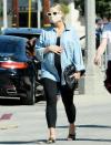 <p>Mama-to-be Ashlee Simpson cradles her baby bump as she heads to Rocco's Tavern in Studio City, California on Monday.</p>