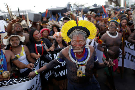 Brazilian Indians take part in a demonstration against the violation of indigenous people's rights, in Brasilia, Brazil April 25, 2017. REUTERS/Ueslei Marcelino