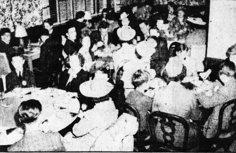After attending a free showing of Fantasia, Eagle-Gazette carriers and their mothers were invited to the Hotel Lancaster. They are shown in this photo enjoying ice cream sundaes and cookies on Mother's Day, May 10, 1942. Photo appeared in the May 11, 1942 E-G.