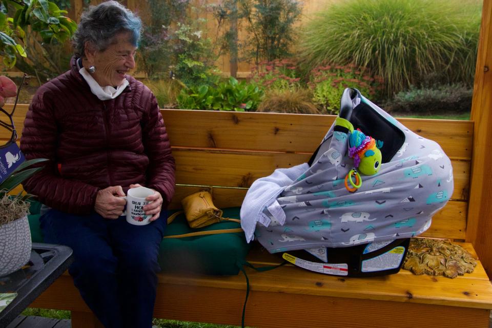 Fran Goldman, 90, sits with her great-grandson, Silas.