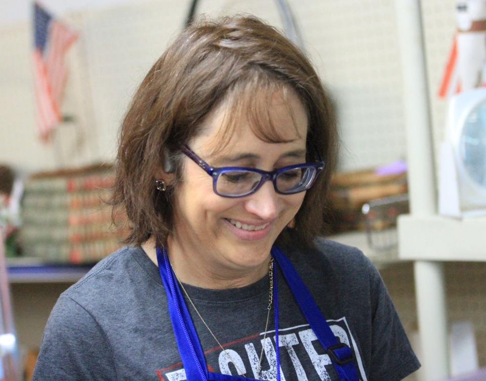 Netti Nau, 53, has been working at St. Vincent de Paul Thrift Store in Newark this spring while recovering from metastatic cancer. Nau is an avid runner and a nurse at Daniel L. Kinnard VA clinic in Newark.