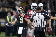 New Orleans Saints quarterback Drew Brees (9) reacts to the officials after prematurely blowing a play dead in the first half of an NFL football game against the Arizona Cardinals in New Orleans, Sunday, Oct. 27, 2019. (AP Photo/Butch Dill)