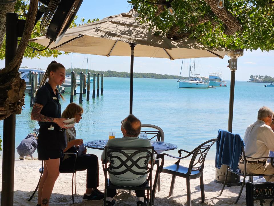 Mar Vista Dockside Restaurant, which offers seating at wrought-iron tables located under the buttonwood trees overlooking Sarasota Bay, photographed Feb. 24, 2024.