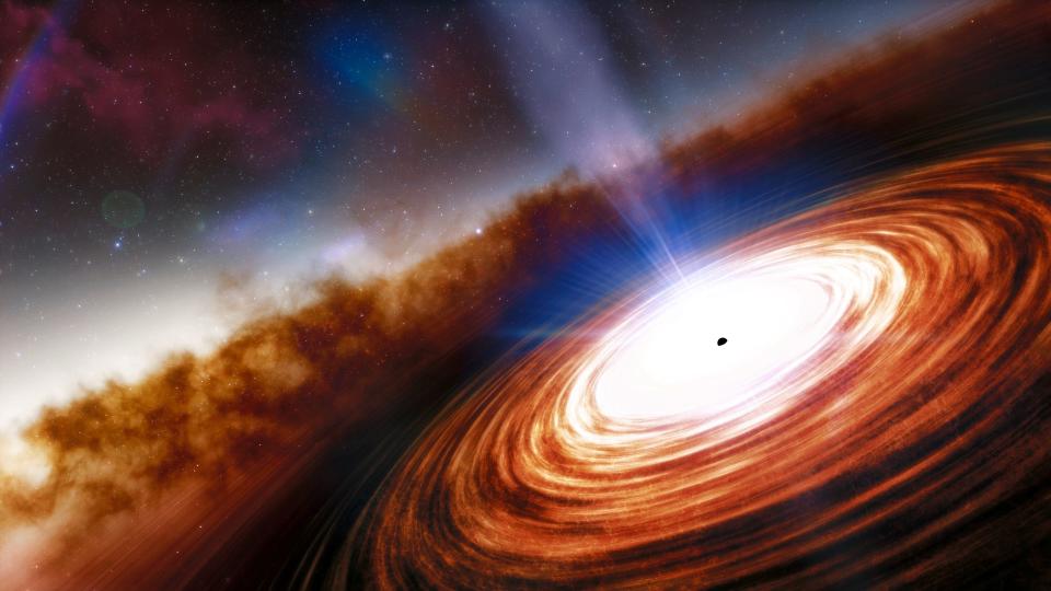 An artist's conception of the quasar, which is one of the most powerful, energetic objects in the universe. It is powered by a supermassive black hole weighing more than 1.6 billion times the mass of our sun.