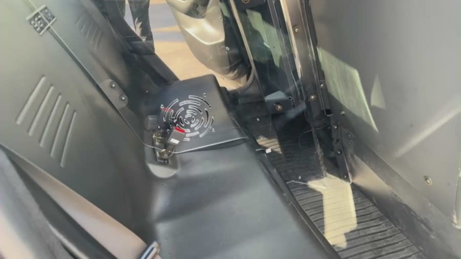 The specially outfitted backseat of Anaheim Police Department's new Tesla Model Y patrol vehicles. (KTLA)