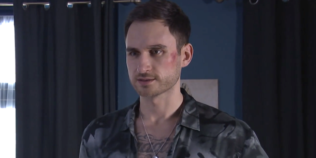 freddie in hollyoaks, a tattooed man unbuttons his shirt