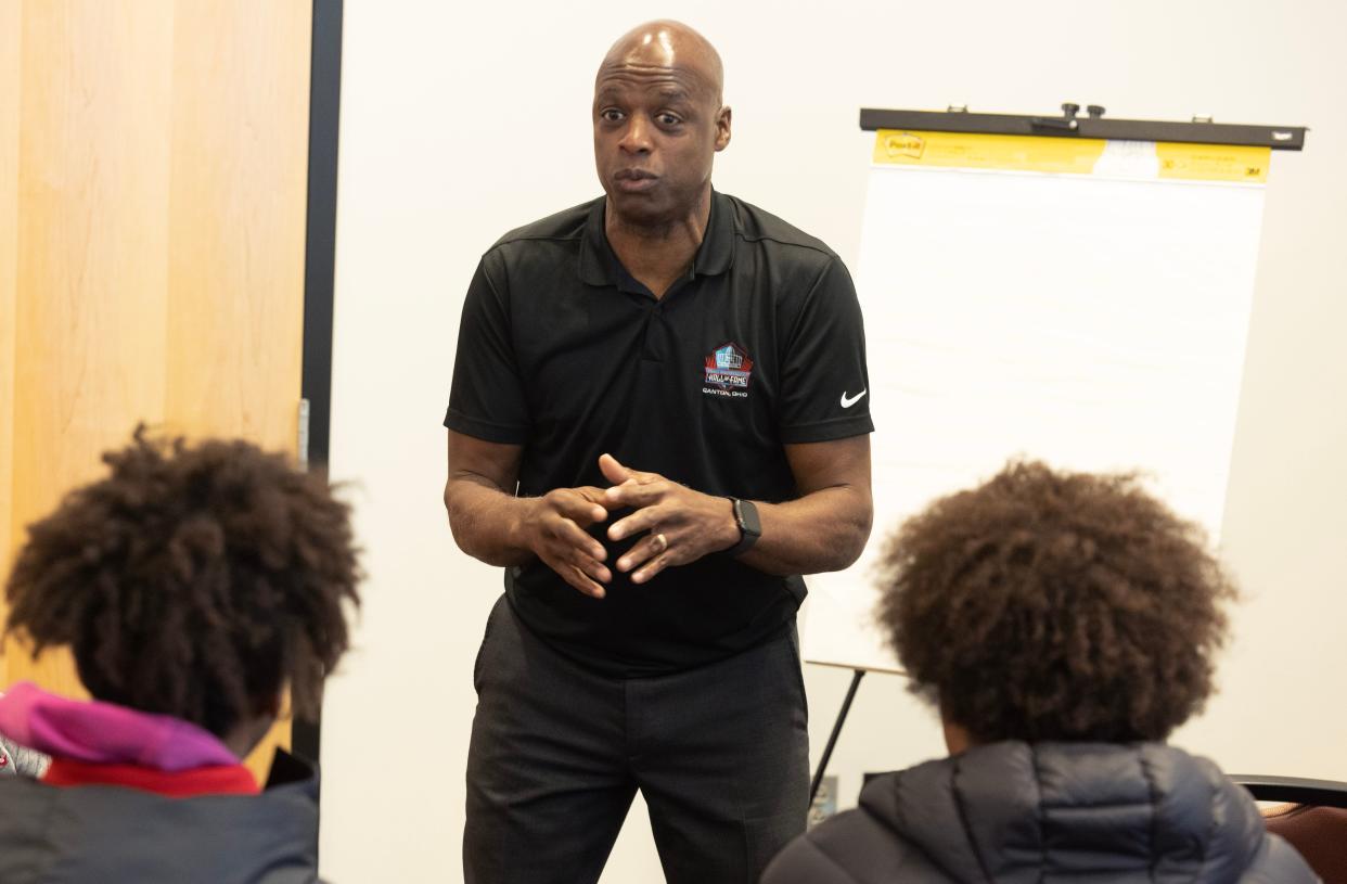 Pro Football Hall of Fame enshrinee Darrell Green talks Monday with local students during a group discussion at the Hall in Canton. A renewed and enhanced partnership between Centene Corp. and the Pro Football Hall of Fame will continue to bring youth-focused programming to communities nationwide.