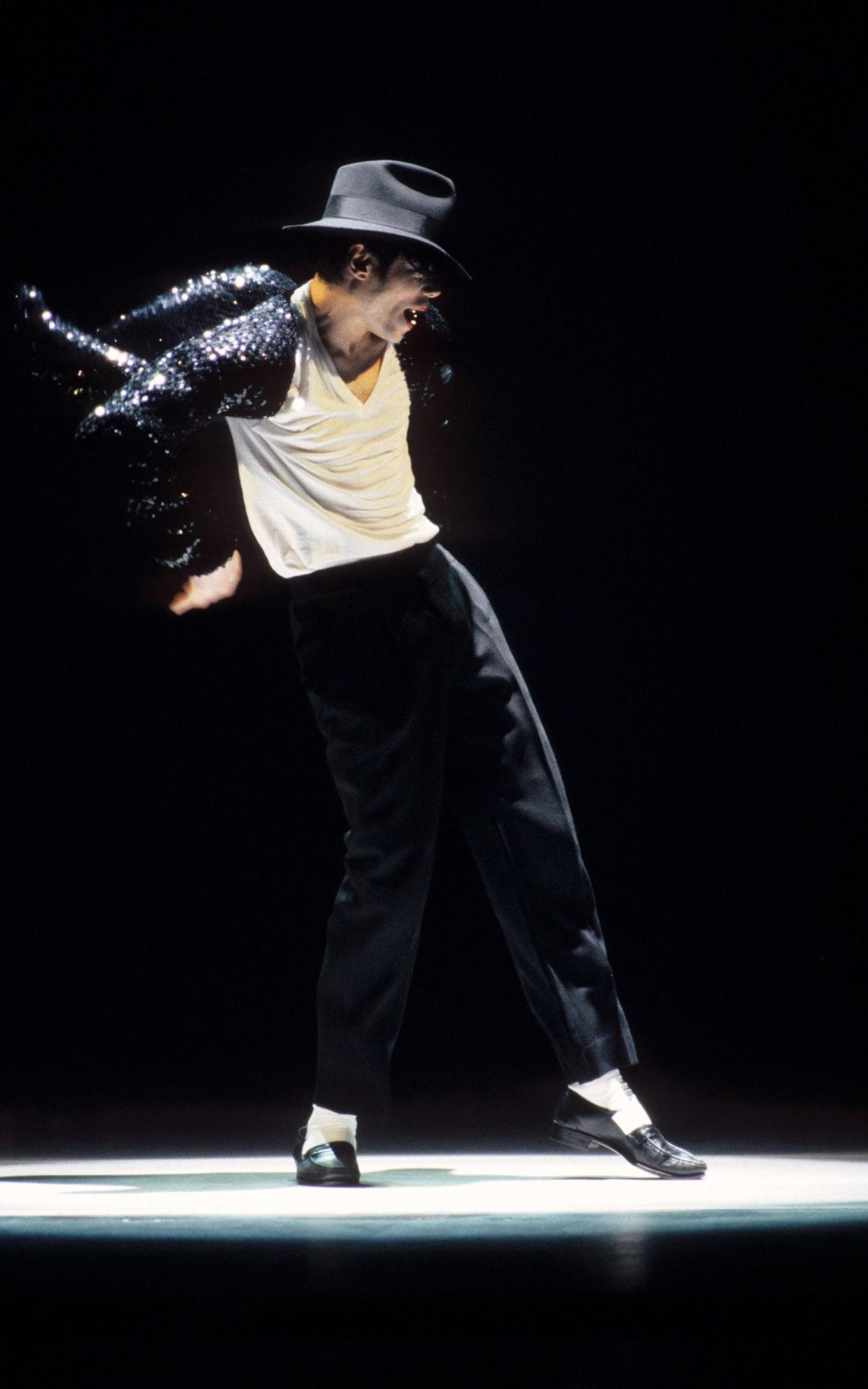 Michael Jackson's iconic Moonwalk, aided by his black loafers and white socks, shown here at Radio City Music Hall in New York, 1995 - 2009 Kevin Mazur