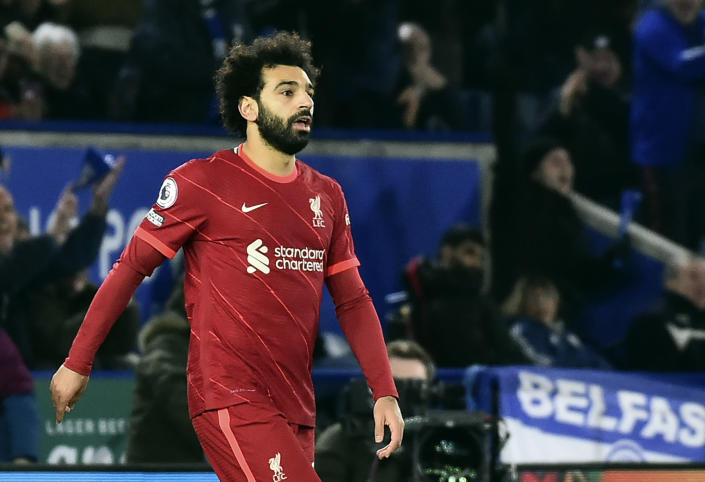 Liverpool's Mohamed Salah reacts after missing a chance to score from penalty during the English Premier League soccer match between Leicester City and Liverpool at the King Power Stadium in Leicester, England, Tuesday, Dec. 28, 2021. (AP Photo/Rui Vieira)