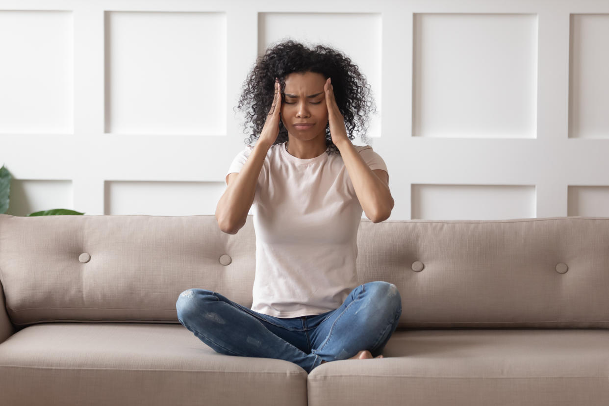 Woman experiencing a hormonal imbalance. (Getty Images)