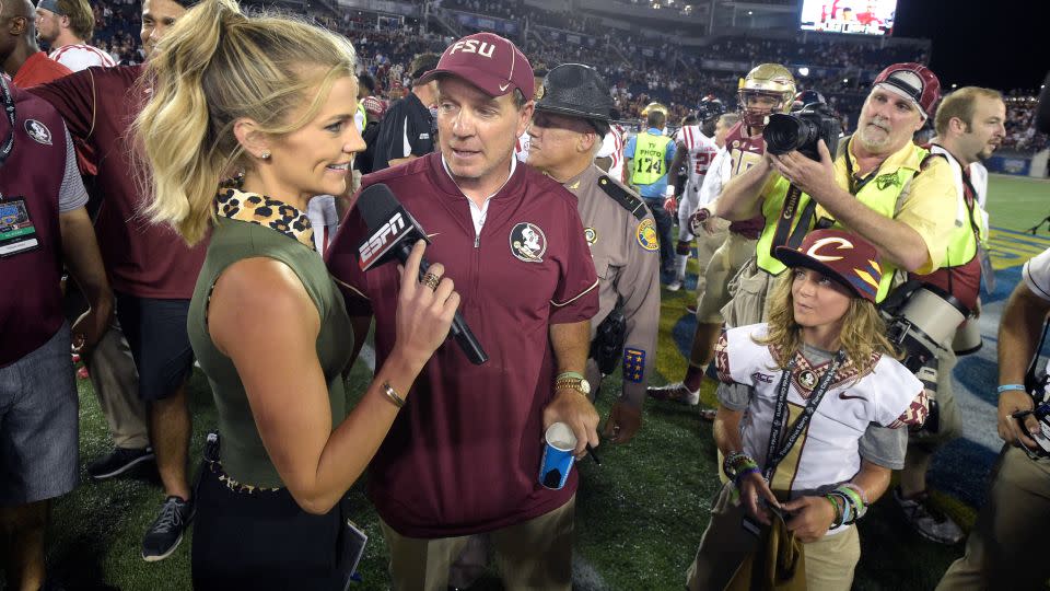 Samantha Ponder, left, interviews then-Florida State head coach Jimbo Fisher after a game in 2016. - Phelan M. Ebenhack/AP