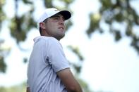 Scottie Scheffler watches his shot off the third hole during the third round of the Charles Schwab Challenge golf tournament at the Colonial Country Club, Saturday, May 28, 2022, in Fort Worth, Texas. (AP Photo/Emil Lippe)