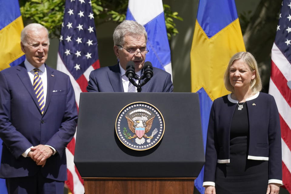 Finnish President Sauli Niinisto speaks, with President Joe Biden and Swedish Prime Minister Magdalena Andersson, in the Rose Garden of the White House in Washington, Thursday, May 19, 2022. (AP Photo/Andrew Harnik)