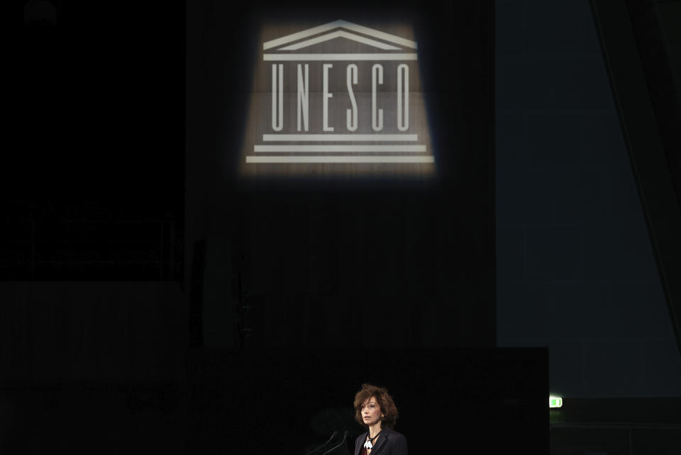 UNESCO Director General Audrey Azoulay, delivers her speech during a conference on guidelines for regulating digital platforms, Wednesday, Feb. 22, 2023 in Paris. UNESCO is leading consultations on ways to regulate digital platforms and making the internet a safer space. The two-day conference aims to formulate guidelines and principles that would help regulators, governments, lawmakers and business manage content that undermines democracy and human rights while supporting freedom of expression and promoting the availability of accurate and reliable information. (AP Photo/Aurelien Morissard)