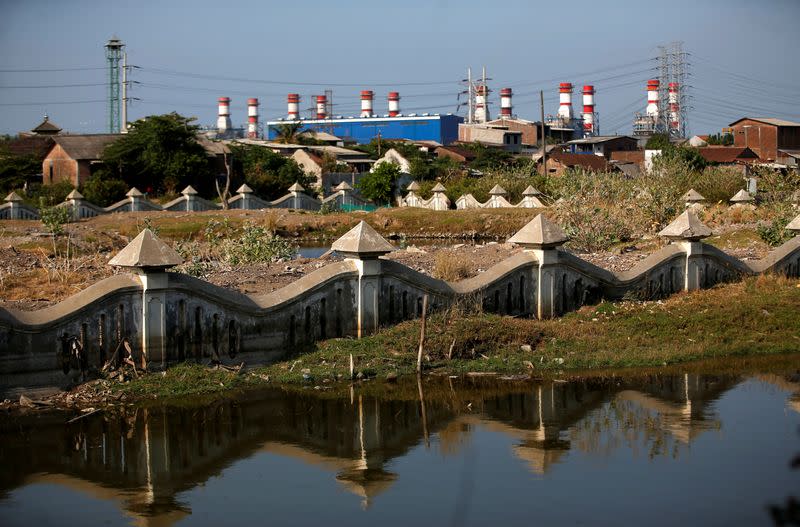 A damaged building which used to be a factory is pictured near the coastal area of Semarang, which has been affected by land subsidence and rising sea level