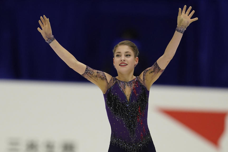 Alena Kostornaia of Russia acknowledges the crowd after performing in the ladies free skating program during the ISU Grand Prix of Figure Skating in Sapporo, northern Japan, Saturday, Nov. 23, 2019. (AP Photo/Toru Hanai)