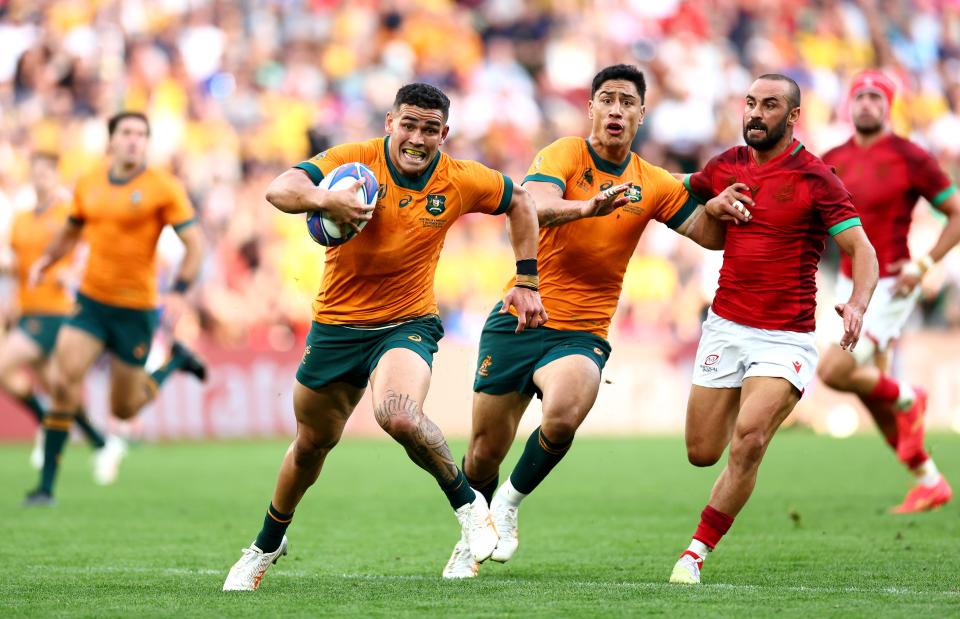 Izaia Perese of Australia breaks with the ball (Getty Images)