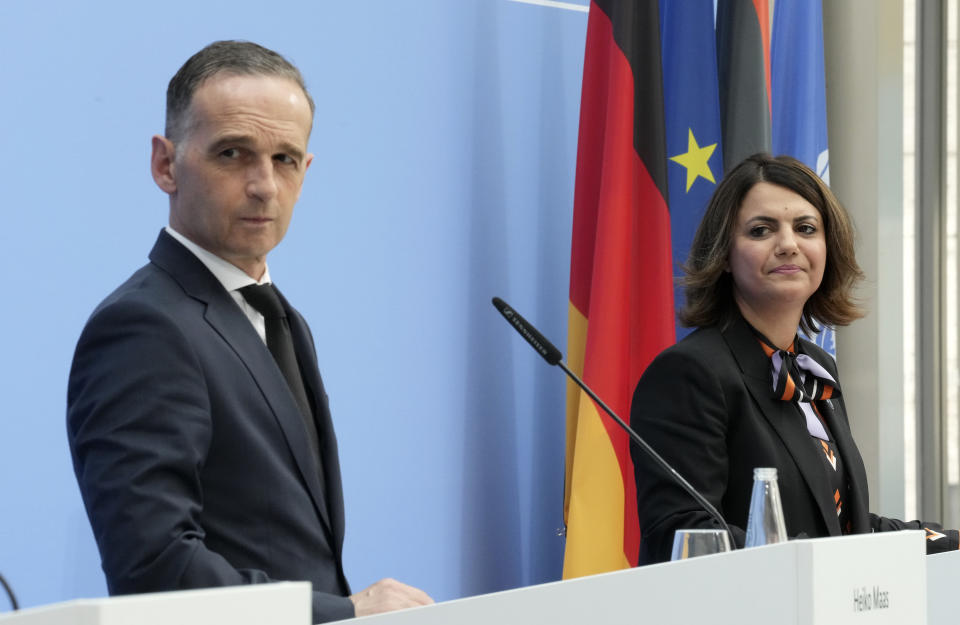 German Foreign Minister Heiko Maas, left, and Libyan Foreign Minister Najla Mangoush attend a joint press conferences part of the 'Second Berlin Conference on Libya' at the foreign office in Berlin, Germany, Wednesday, June 23, 2021. (AP Photo/Michael Sohn, pool)