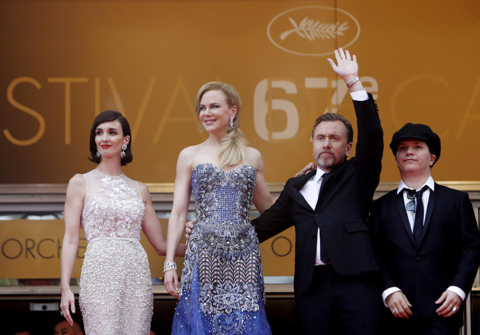From left, actress Paz Vega, actress Nicole Kidman, actor Tim Roth and director Olivier Dahan stand at the top of the carpet during the opening ceremony and screening of Grace of Monaco at the 67th international film festival, Cannes, southern France, Wednesday, May 14, 2014. (AP Photo/Thibault Camus)