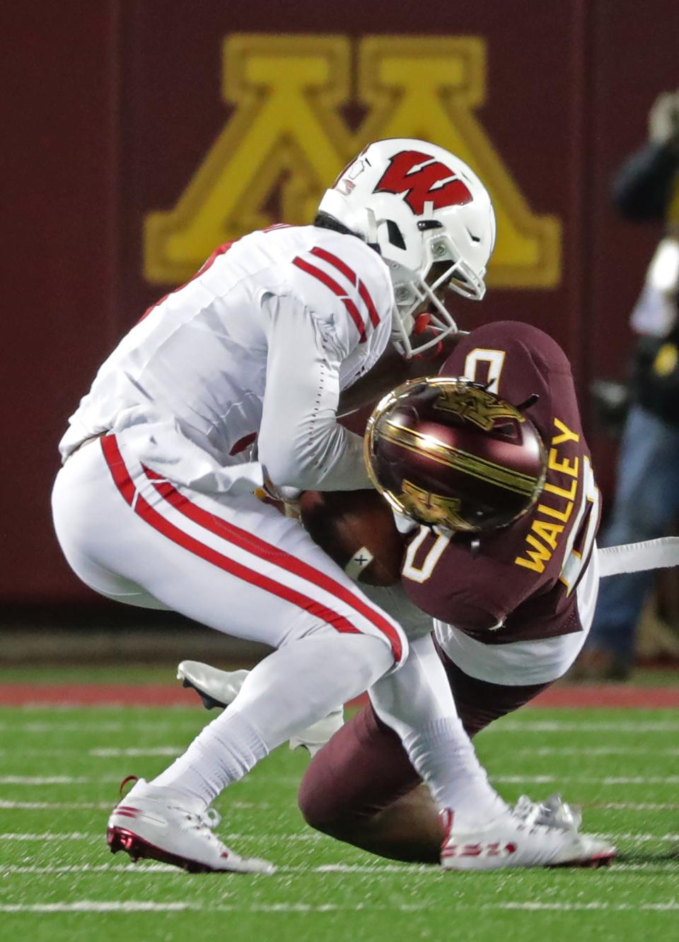 Minnesota defensive back Justin Walley comes up with a game-changing interception last year on  a pass intended for Wisconsin wide receiver Kendric Pryor.