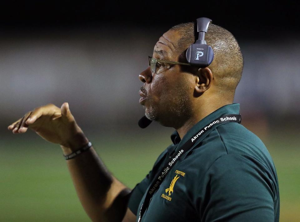 Firestone coach Eric Mitchell works the sideline against Copley on Aug. 26, 2022, in Copley.