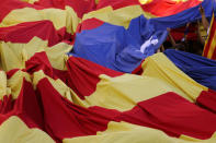 People carry a huge Estelada (Catalan separatist flag) during a rally on Catalonia's national day 'La Diada' in Barcelona, Spain, September 11, 2017. REUTERS/Susana Vera