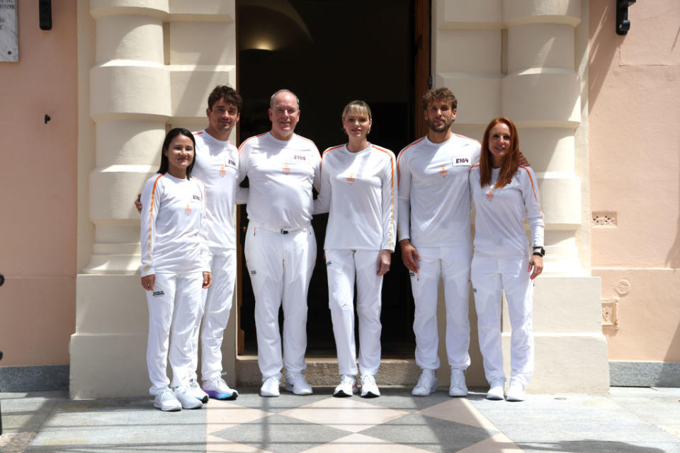 Xiaoxin Yang, Charles Leclerc, Albert II, Prince of Monaco, Charlene, Princess of Monaco, Rudy Rinaldi and Alexandra Coletti attend the Olympic flame lighting