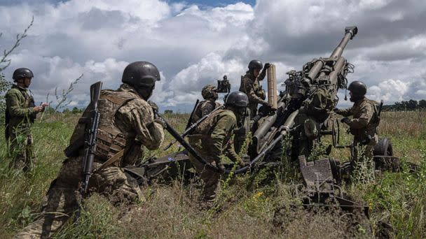 PHOTO: Ukrainian servicemen prepare to fire at Russian positions from a U.S.-supplied M777 howitzer in Kharkiv region, Ukraine, July 14, 2022. (Evgeniy Maloletka/AP)