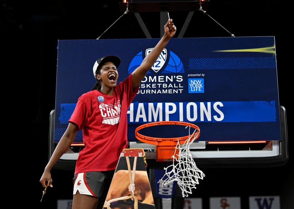 Washington State center Bella Murekatete celebrates after the Cougars beat UCLA in the final of the Pac-12 women's basketball tournament.