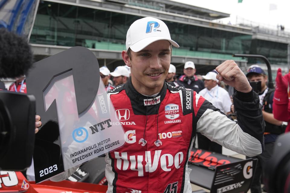 FILE - Christian Lundgaard, of Denmark, celebrates after winning the pole for the IndyCar Grand Prix auto race at Indianapolis Motor Speedway, Friday, May 12, 2023, in Indianapolis. Arrow McLaren Racing is making yet another change to its IndyCar lineup and will replace Alexander Rossi with Christian Lundgaard. Rossi spent last season and this with McLaren, while Lundgaard, of Denmark, has been with Rahal Letterman Lanigan. (AP Photo/Darron Cummings, File)