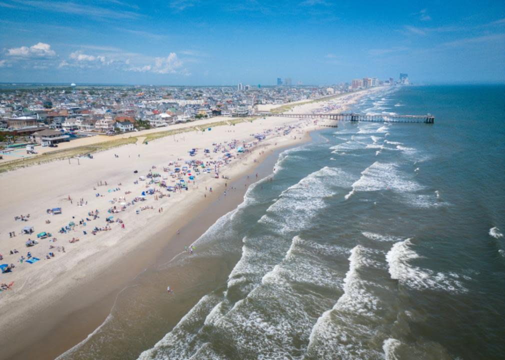 Aerial view town by the ocean and beach.