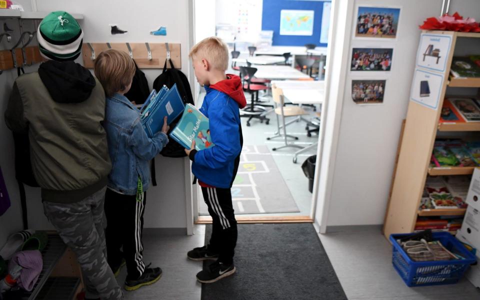 Primary school pupils returned to their classes in Helsinki last month - REUTERS