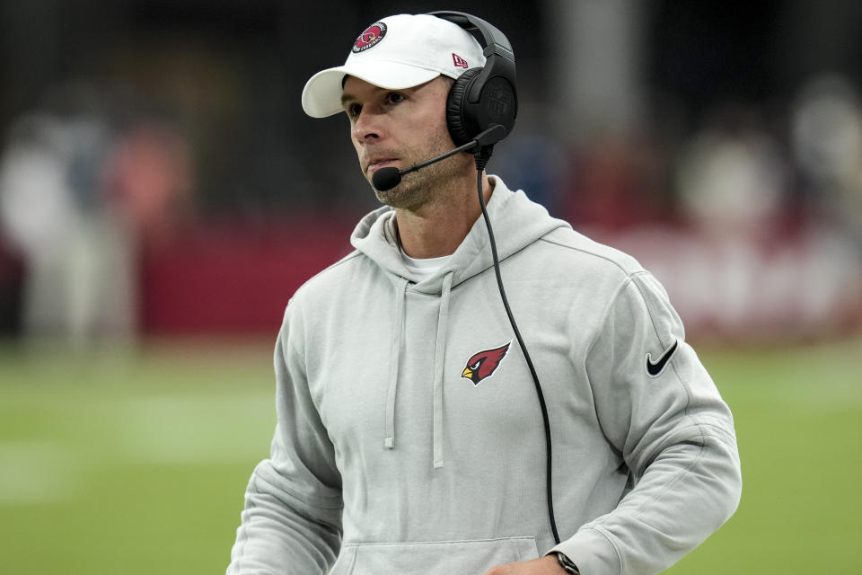 Arizona Cardinals head coach Jonathan Gannon walks on the sidelines during the first half of an NFL football game against the Los Angeles Rams, Sunday, Sept. 15, 2024, in Glendale, Ariz. (AP Photo/Ross D. Franklin)