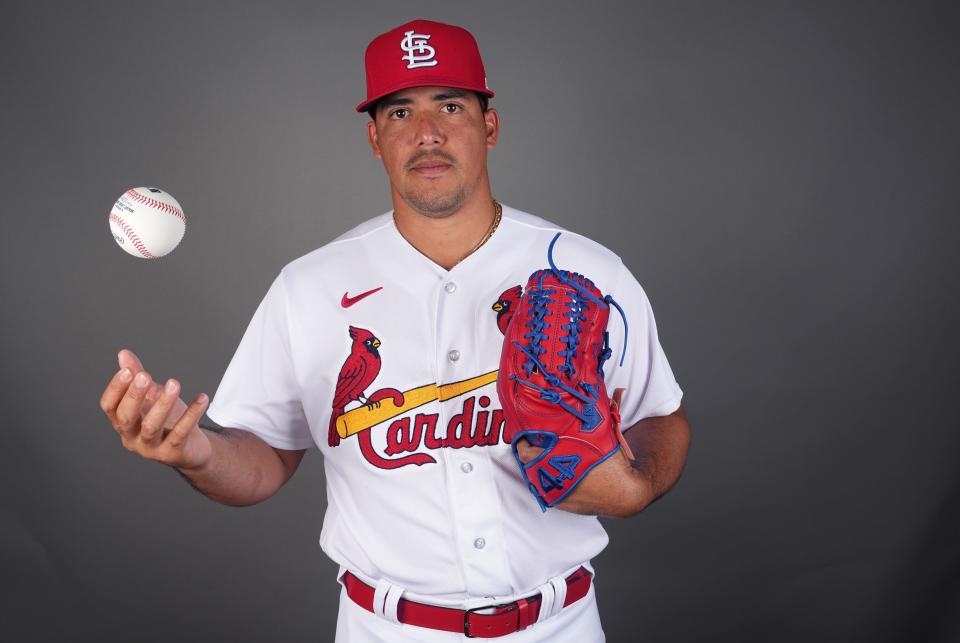 St.  Louis Cardinals relief pitcher Freddy Pacheco (64) poses for a portrait during spring training photo day.