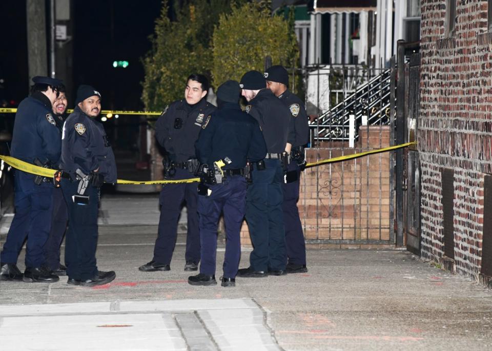 Police are spotted at the scene following a fatal shooting on 256 east 37th street in Brooklyn, New York. Wayne Carrington