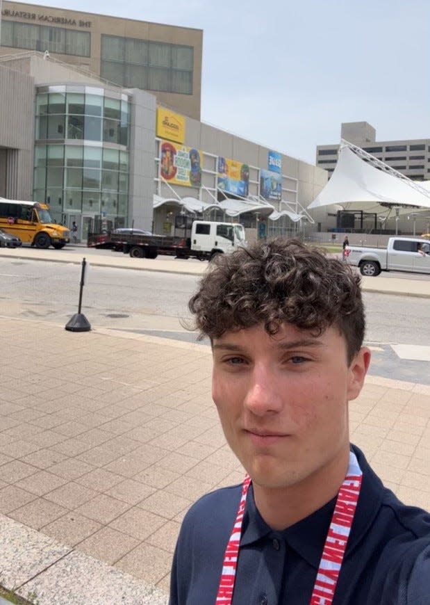 Licking Valley senior Brenden Moore worked at the NFL draft in Kansas City last month with a group of students representing Kent State.