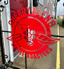 A welcoming sign outside Cherry Blend Coffee Roasters in Canton.