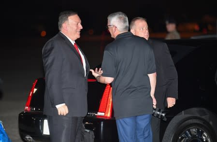 U.S. Secretary of State Mike Pompeo gets ready to board his plane departing from Andrews Air Force Base in Maryland