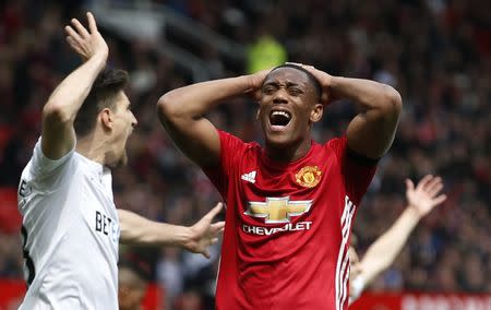 Britain Football Soccer - Manchester United v Swansea City - Premier League - Old Trafford - 30/4/17 Manchester United's Anthony Martial looks dejected after a missed chance Reuters / Andrew Yates Livepic