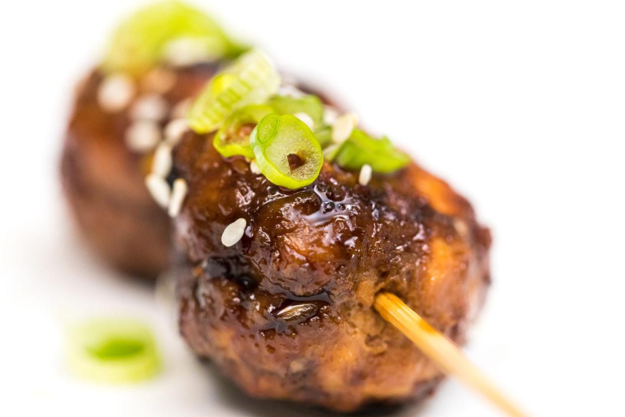 These tasty turkey meatballs with an Asian-style dipping sauce make the perfect pair.