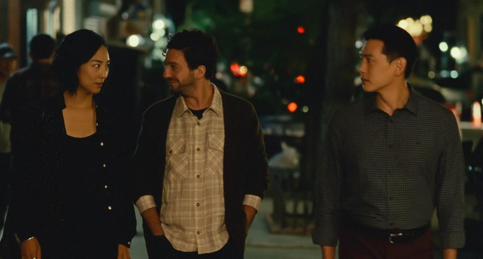 Greta Lee, John Magaro and Teo Yoo in a scene from the film "Past Lives."