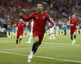 <p>Elation: Ronaldo is jubilant after scoring just his fourth ever World Cup goal. (AP) </p>