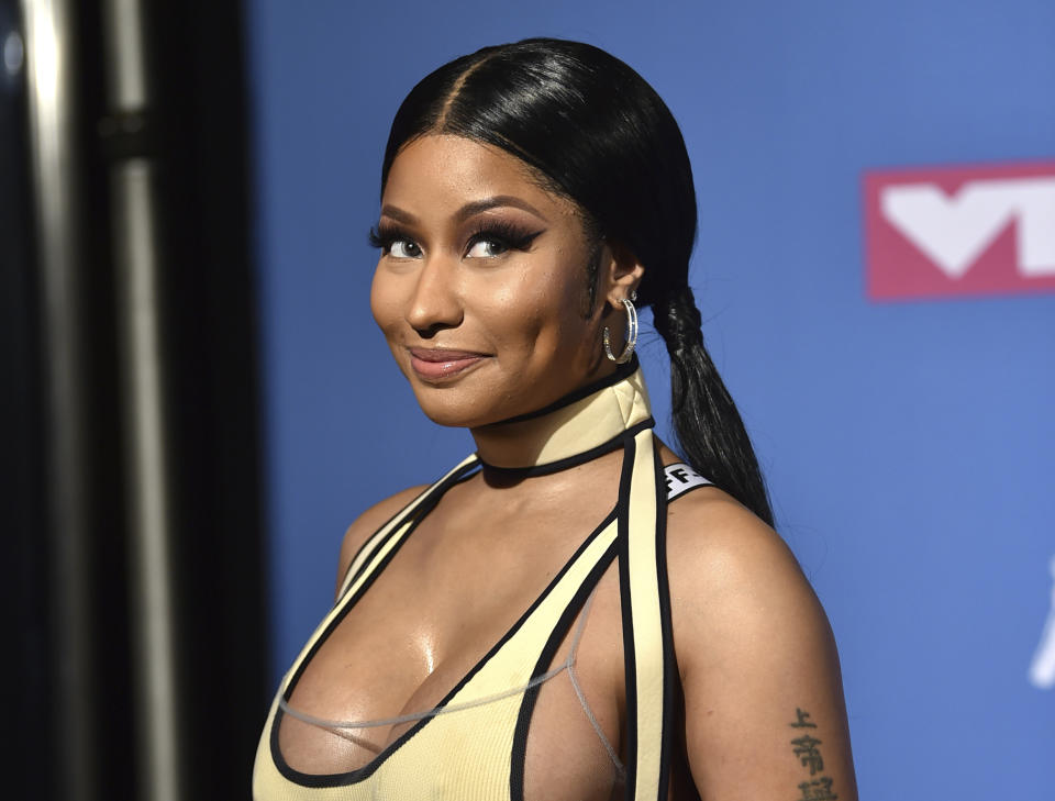FILE - Nicki Minaj appears at the MTV Video Music Awards in New York on Aug. 20, 2018. Minaj will receive the Video Vanguard Award at the MTV Awards later this month. Minaj, who has won five MTV trophies for such hits as “Anaconda,” “Chun-Li” and “Hot Girl Summer,” will get the award and perform at the ceremony on Aug. 28 at the Prudential Center in Newark, N.J. (Photo by Evan Agostini/Invision/AP, File)