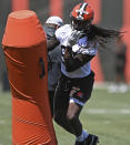 Cleveland Browns defensive linemen Jadeveon Clowney (90) participates in a drill during an NFL football practice at the team's training facility, Thursday, June 17, 2021, in Berea, Ohio. (AP Photo/David Dermer)