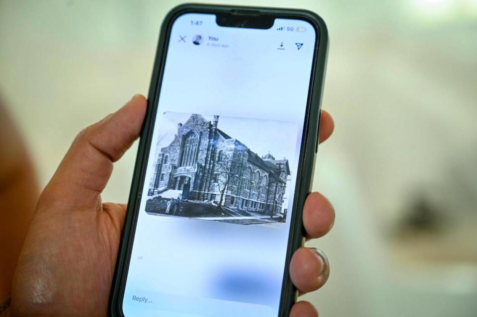 Developer Johnny Youssef displays a photo of the Broadway Baptist Church, which was completed in 1923.