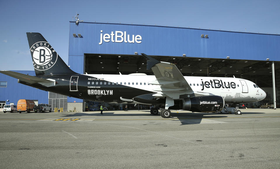 IMAGE DISTRIBUTED FOR JETBLUE - JetBlue reveals its newest aircraft BK Blue which is dedicated to the Brooklyn Nets on Thursday, Nov. 1, 2018 in New York. (Donald Traill/JetBlue via AP Images)