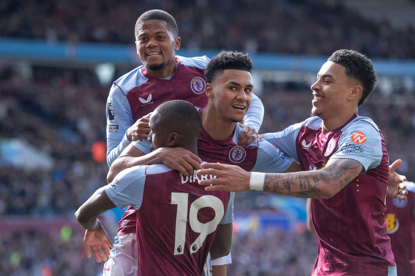 Moussa Diaby of Aston Villa celebrates scoring his team's second goal with team mates Leon Bailey, Ollie Watkins and Morgan Rogers